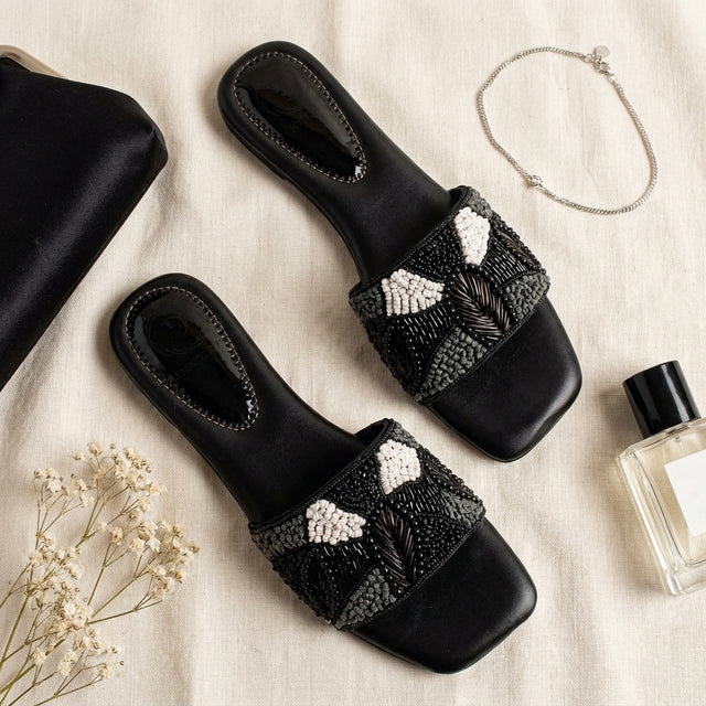 Hala Black Flat Textured Slip-Ons | S212F-B